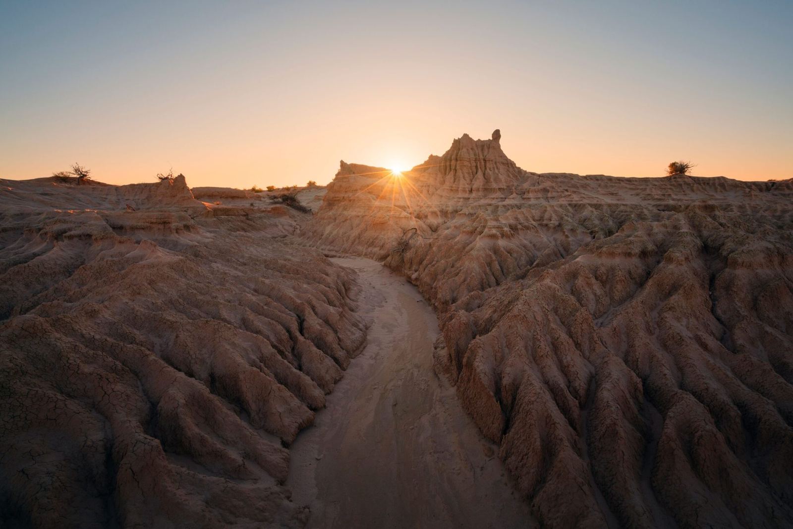 Sun setting over the eroded lunettes of Mungo National Park
