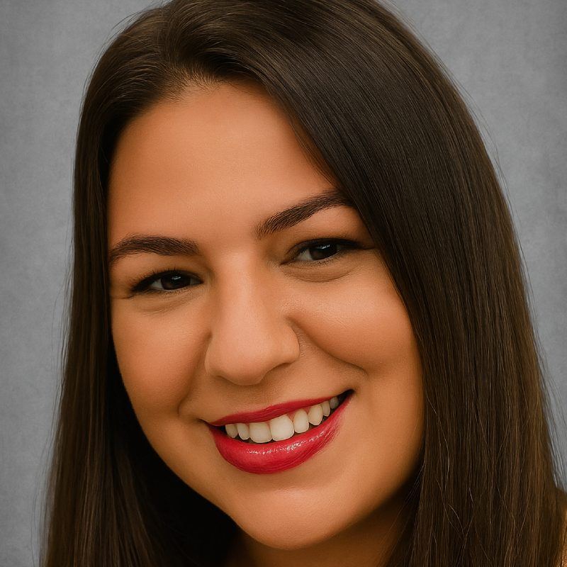 Melanie, wellness facilitator, smiling portrait